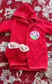 حوله بچه و لباس