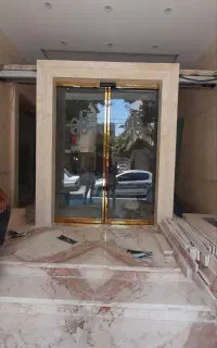 درب شیشه ای اتومات وکرکره برقی وپارتیشن شیشه ای