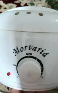 دستگاه موم گرم کن