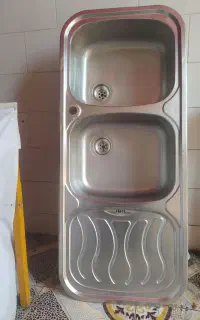 یک عددسینک ظرف شویی تو کار