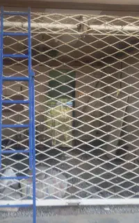 تعویض فنر وتعمیر درب کرکره
