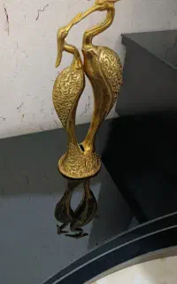 مجسمه برنزی درنای عاشق