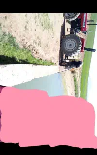 سم پاشی با تراکتور جفت