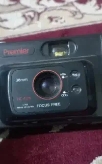 دوربین premier، هدفون، فیگور، دسته فرفره، منج