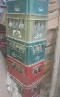 شیشه نوشابه به همراه سبد