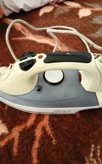 یک عدد اتوی سالم و تمیز