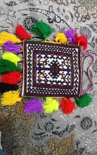 جلدقرآنی دست بافت محلی
