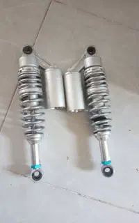 کمک عقب موتور سیکلت
