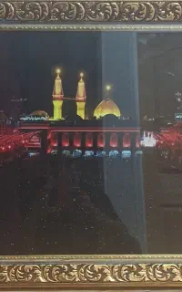 قاب‌عکس بین‌الحرمین با قاب‌طلایی شیک وبدون‌استفاده