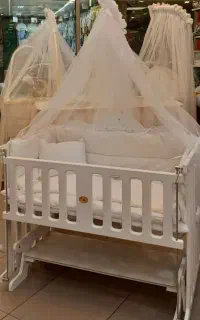 کریر و تخت کنار مادر نوزاد کاملا نو و سالم