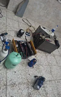 تعمیرات وگازگیری کولرهای پنجره ای دوتیکه همه مناطق