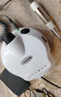 سوهان برقی و دستگاه uv و تعدادی لاک و...
