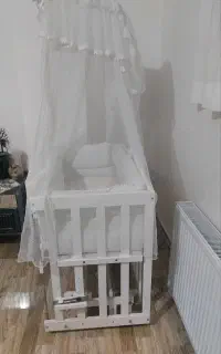 گهواره کنار تخت مادر