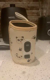 شیشه شیر گرم کن نوزاد نو نو