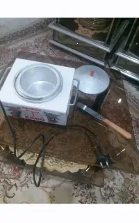دستگاه گرم کن شمع یا موم صورت به همراه کارتک