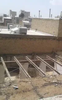 تخریب و خاکبرداری و سیمان کاری و شیب بندی