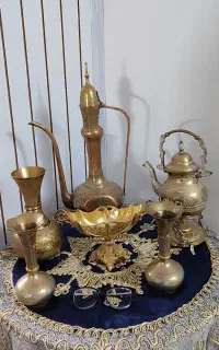گلدان ،گلاب پاش،قوری وارمردار همه برنجی
