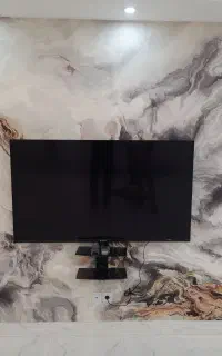 نصاب نصب پایه براکت تلوزیون دیواری ترموال ماربلشیت