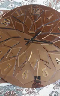 ساعت دیوار آینه ایی طلایی