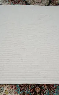 لحاف دوخته می‌شود