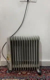 بخاری برقی روغنی کم مصرف و بخاری گازی ۹۰۰۰