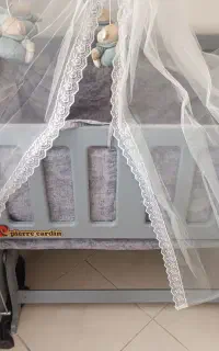 گهواره کنار مادر