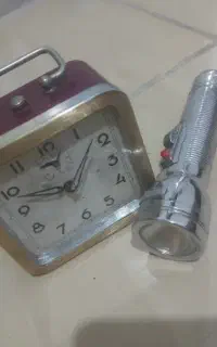 ساعت عتیقه کوکی باچراغ قوه