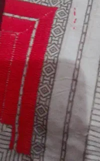 خیاط روبر هستم روی لباس موسومی