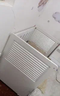 تخت کودک کنار مادر نو