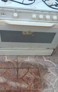 اجاق گاز‌ فر دار.