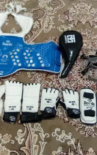 یک دست لباس مبارزه ست کامل تکواندو