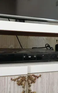 یک عدد دی وی دی فلش خور همراه دو باند