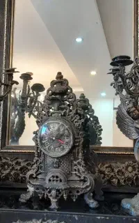 آینه شمعدان و ساعت