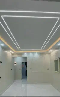 نقاش .نقاشی کناف و ساختمان با اجرای دقیق