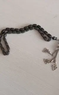 تسبیح ۳۳ دانه حدید صینی تراش ممتاز با کرکوش فلزی