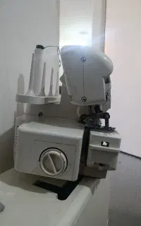 چرخیاطی نو وکار کرده همراه با سردوز