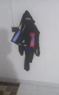 یک عدد ساک سبز با لوازم ورزشی گم کردم