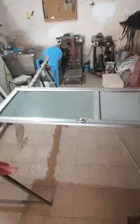 ساخت و تعمیرات انواع درب و پنجره های الومینیومی