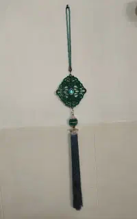 آویز وسط پرده آبی فیروزه ای تمیز و سالم