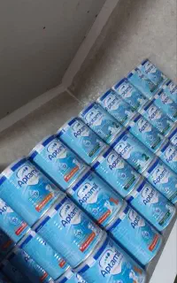 تعدادی قوطی شیر خشک نو نو