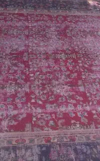 فرش دستباف نخ نما شده