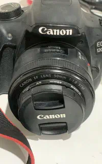 دوربین کانن به همراه لنز ۵۰فیکس