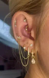 پیرسینگ گوش لب ابرو بینی ناف میکرودرمال کاشت نگین