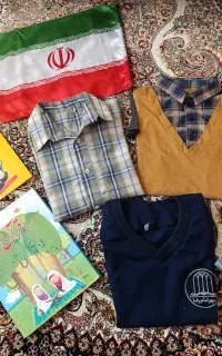 کلاه اسباب‌بازی آتش نشانی لباس پسرانه کتاب داستان