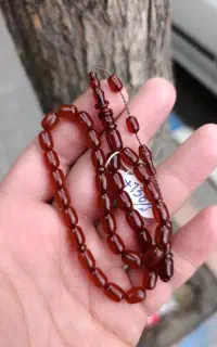 تسبیح کهربا ریز کپسولی النگودار