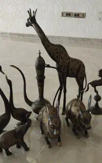 مجموعه مجسمه برنجی قلمکاری شده