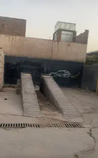 گاراژ بزرگ کارواش با لوازم و آب رایگان