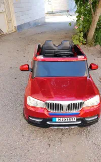 ماشین شارژی BMW رنگ آلبالویی متالیک