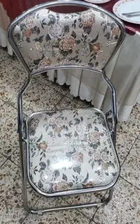خریدار صندلی فلزی تاشو از این مدل