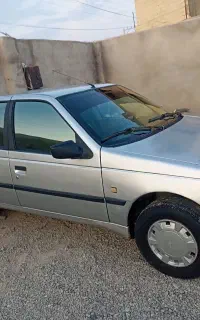 پژو 405 نقره‌ای مدل 93